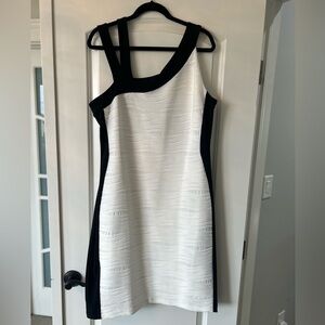 Ivory and Black cocktail dress. One shoulder. Never worn. Tags on.